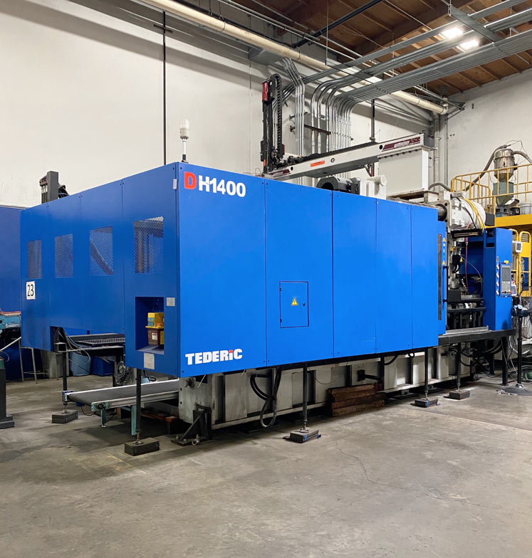 our 1500 ton injection molding machine, very unique and rare in California